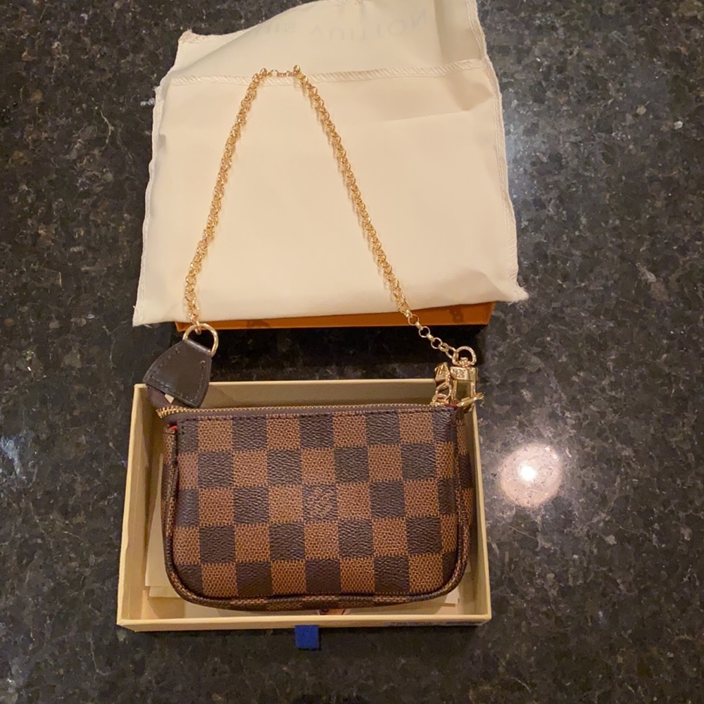 Authentic Louis Vuitton Pochette brown monogram